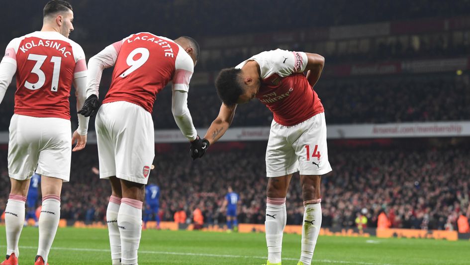Alexandre Lacazette (left centre) celebrates his goal for Arsenal against Chelsea with Pierre-Emerick Aubameyang (right)
