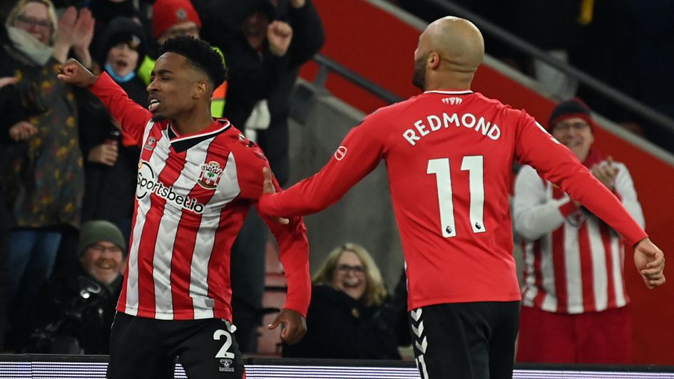 Kyle Walker-Peters celebrates his opening goal against Manchester City
