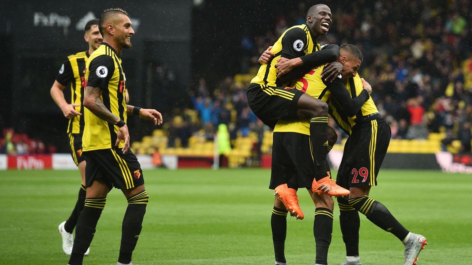 Jose Holebas (second right) celebrates with his teammates after scoring for Watford
