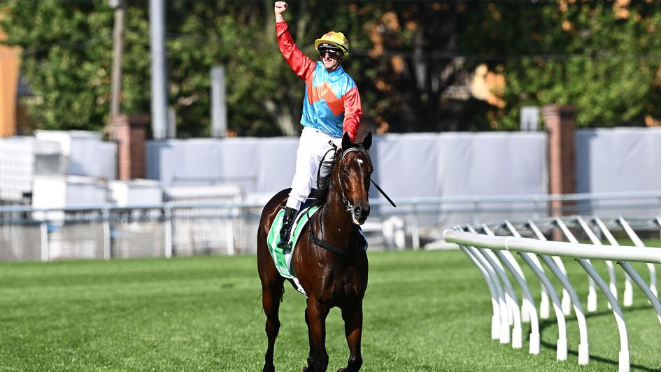Jockey Zac Purton celebrates on Ka Ying Rising