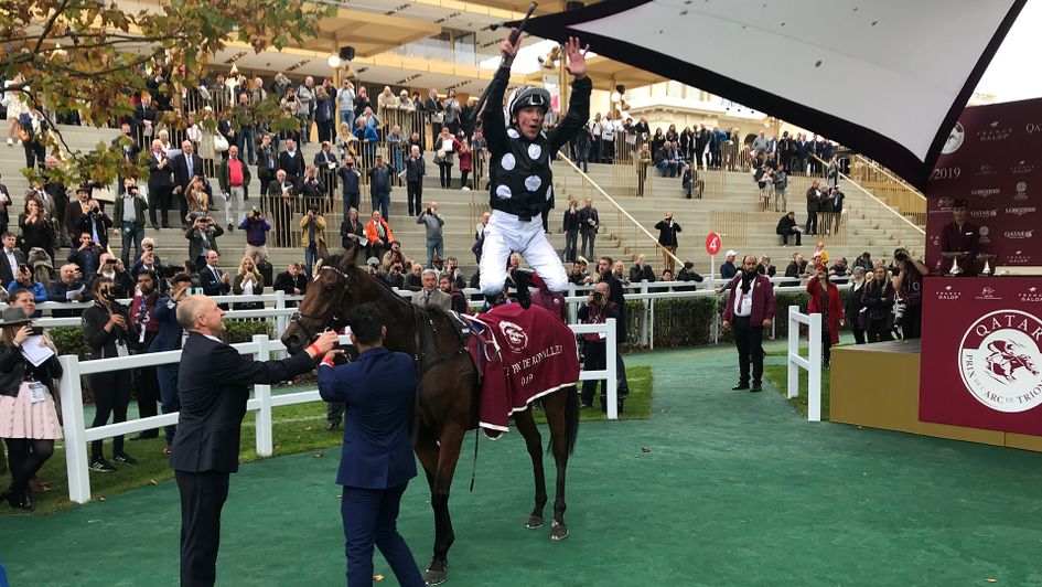 Dettori celebrates his win on Anapurna with the flying dismount