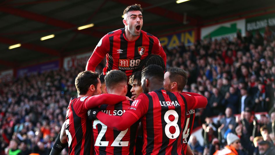 Bournemouth celebrate Nathan Ake's goal - he's in there somewhere