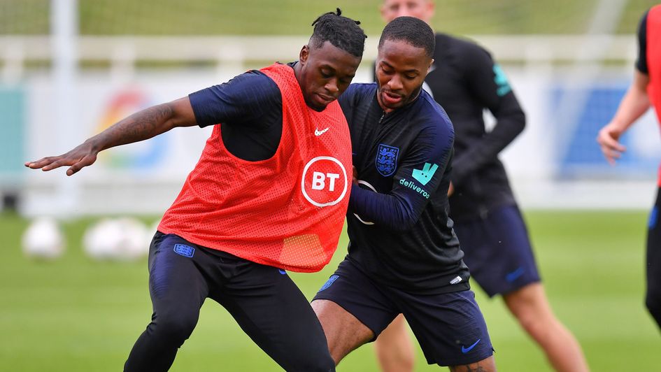Aaron Wan-Bissaka: Man United defender (left) pictured in England training
