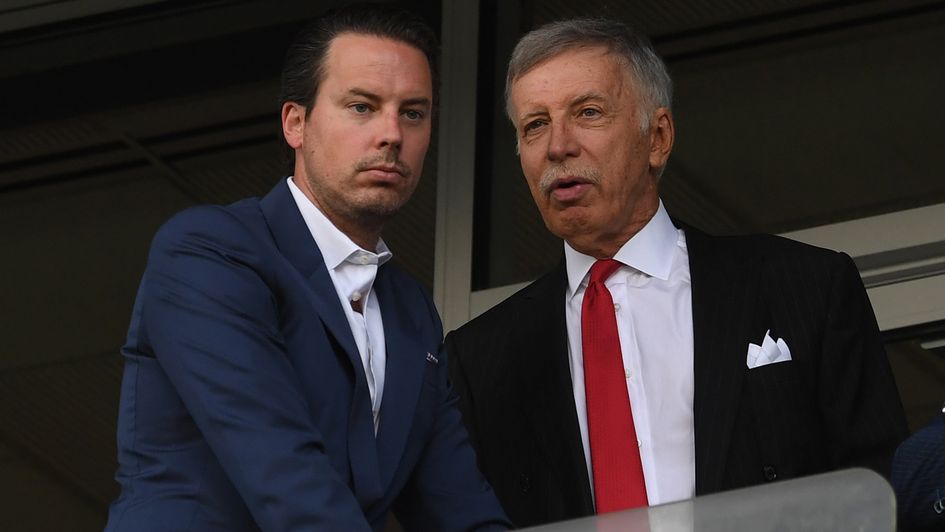 Josh Kroenke and father Stan Kroenke, Arsenal owner, watch the club in action during pre-season
