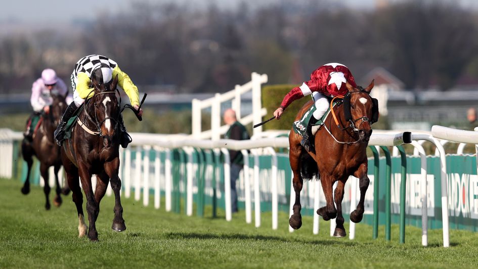 Tiger Roll (right) got the better of a fast-finishing Pleasant Company in the Grand National