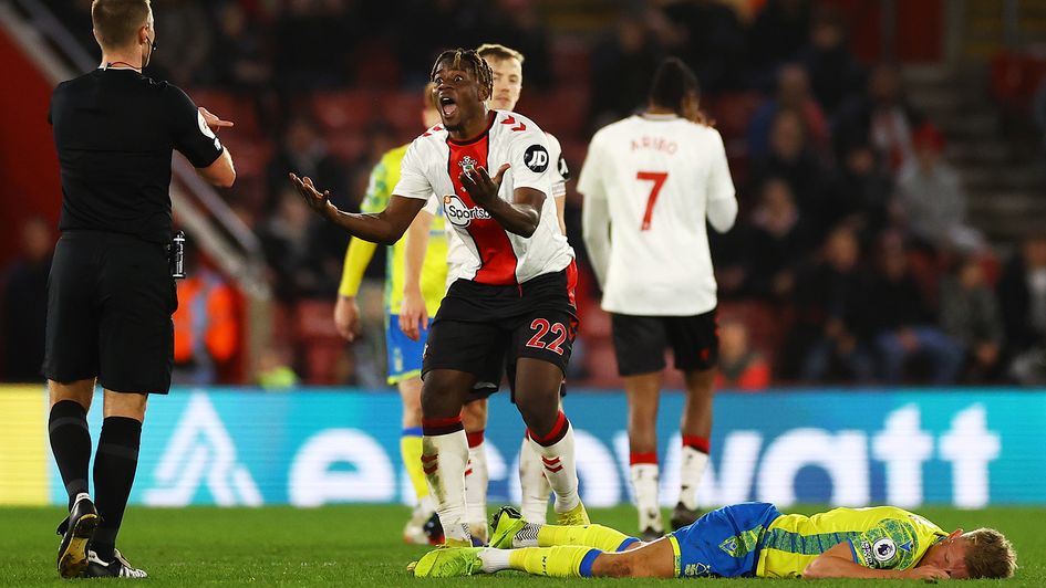 Mohammed Salisu reacts after a foul