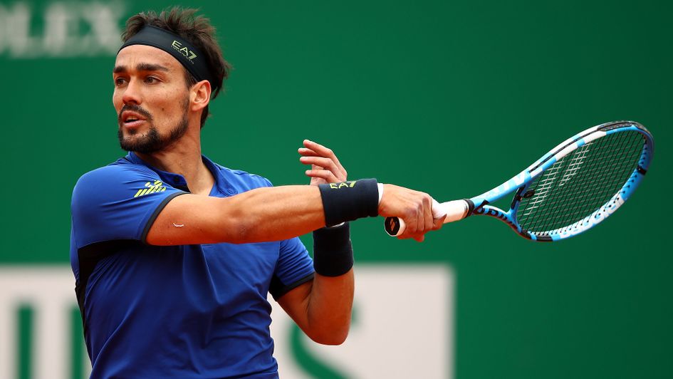 Fabio Fognini of Italy plays a forehand against Dusan Lajovic of Serbia