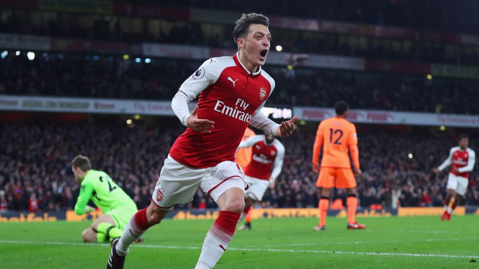 Mesut Ozil celebrates his goal which put the Gunners 3-2 up