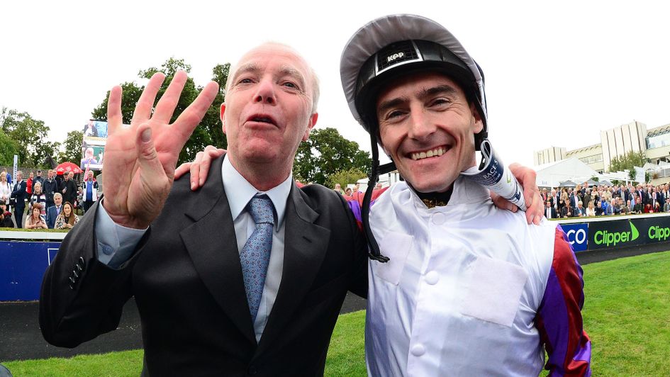 Karl Burke (left) celebrates with Danny Tudhope