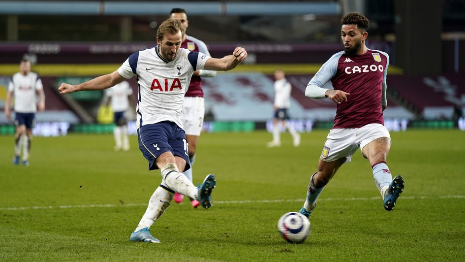 Tottenham Hotspur's Harry Kane has a shot on goal during the Premier League match against Aston Villa