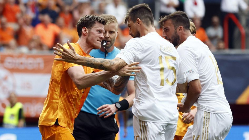 Wout Weghorst and Francesco Acerbi clash in the Nations League