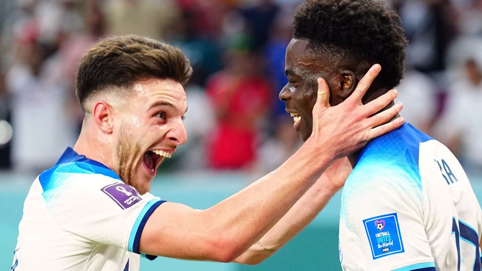 Bukayo Saka (right) is congratulated by Declan Rice