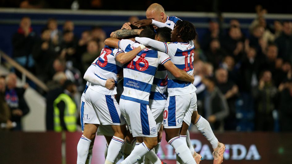 QPR celebrate after scoring against Aston Villa