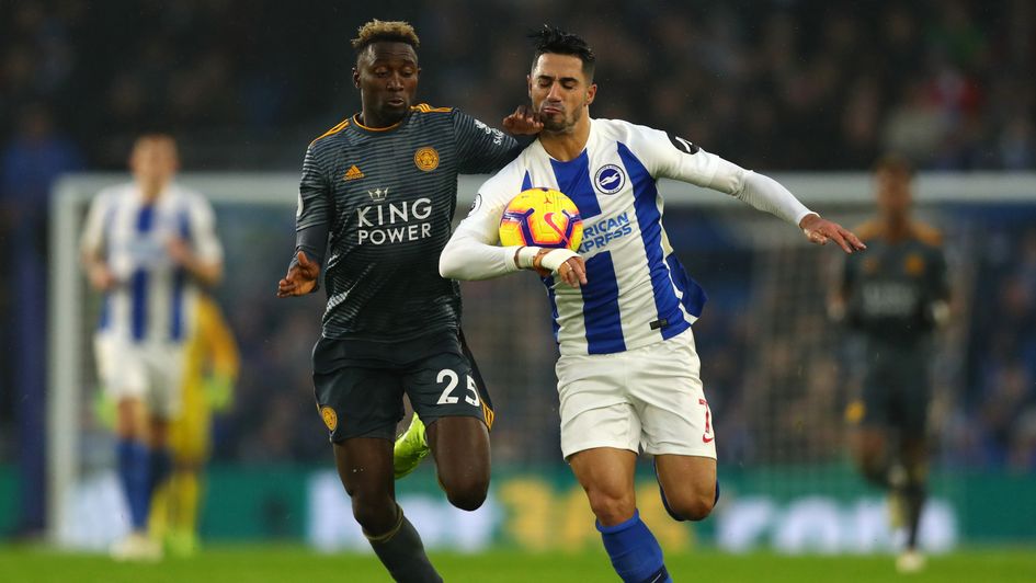 Brighton's Beram Kayal (right) battles for possession with Leicester's Wilfred Ndidi