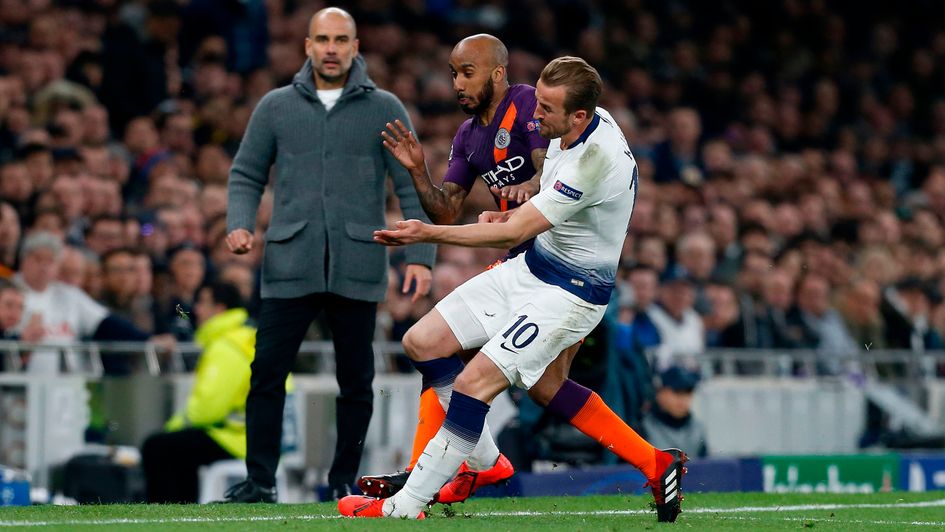 Harry Kane injures his ankle in a challenge with Fabian Delph in Tottenham's Champions League win over Manchester City