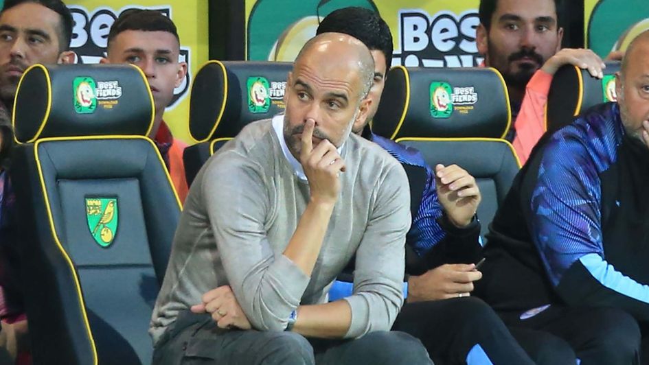 Manchester City boss Pep Guardiola looking glum as the champions lose at Norwich