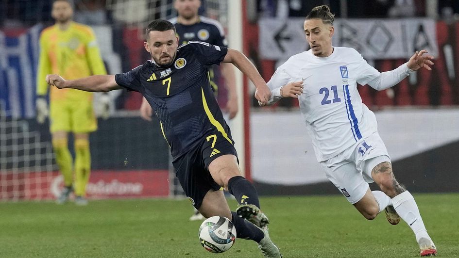 John McGinn battles with Kostas Tsimikas