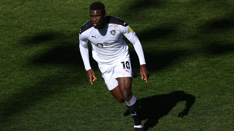 Daryl Dike celebrates a goal against Reading