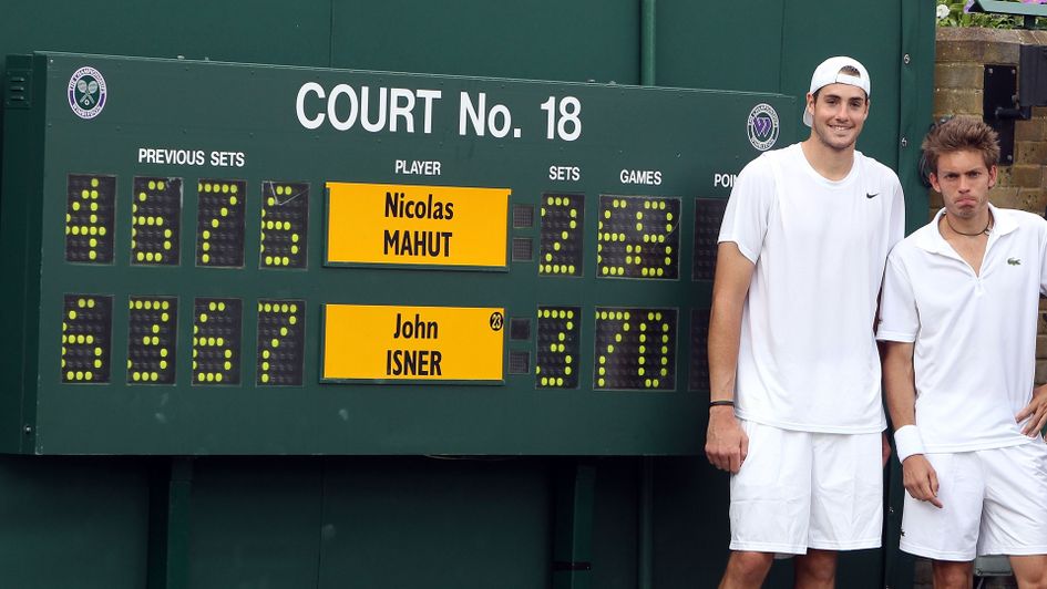 John Isner and Nicolas Mahut after their marathon match in 2010