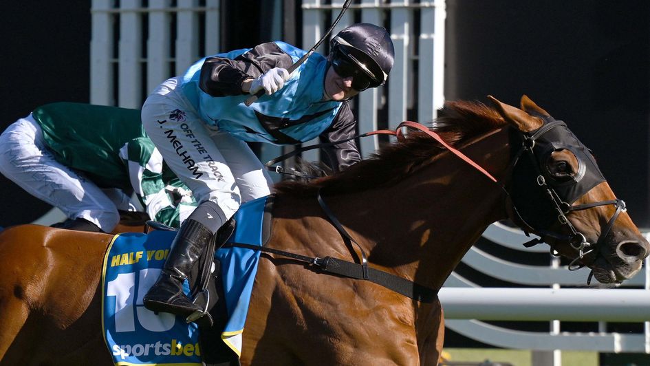 Jamie Melham celebrates as Half Yours wins the Caulfield Cup