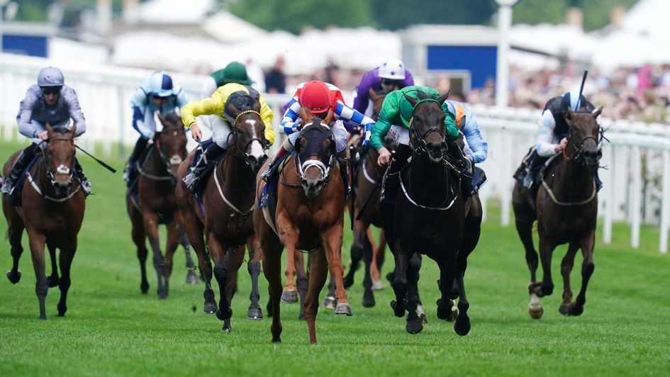 Crimson Advocate (red cap) wins the Queen Mary