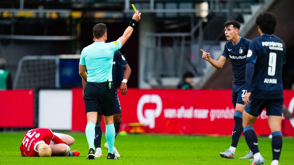 Anel Ahmedhodzic gets a yellow card for Feyenoord against Alkmaar