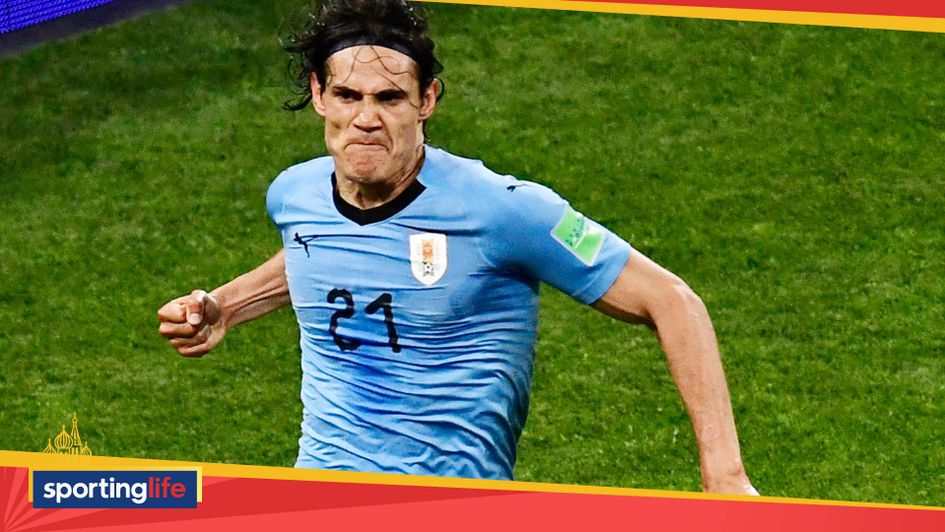 Edinson Cavani celebrates his second goal for Uruguay against Portugal