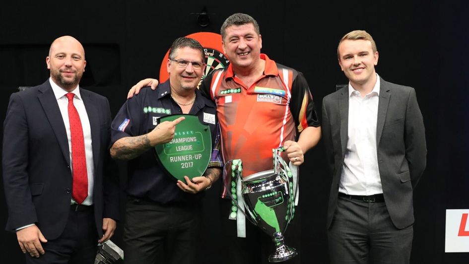 Mensur Suljovic with the Champions League of Darts trophy (Lawrence Lustig, PDC)