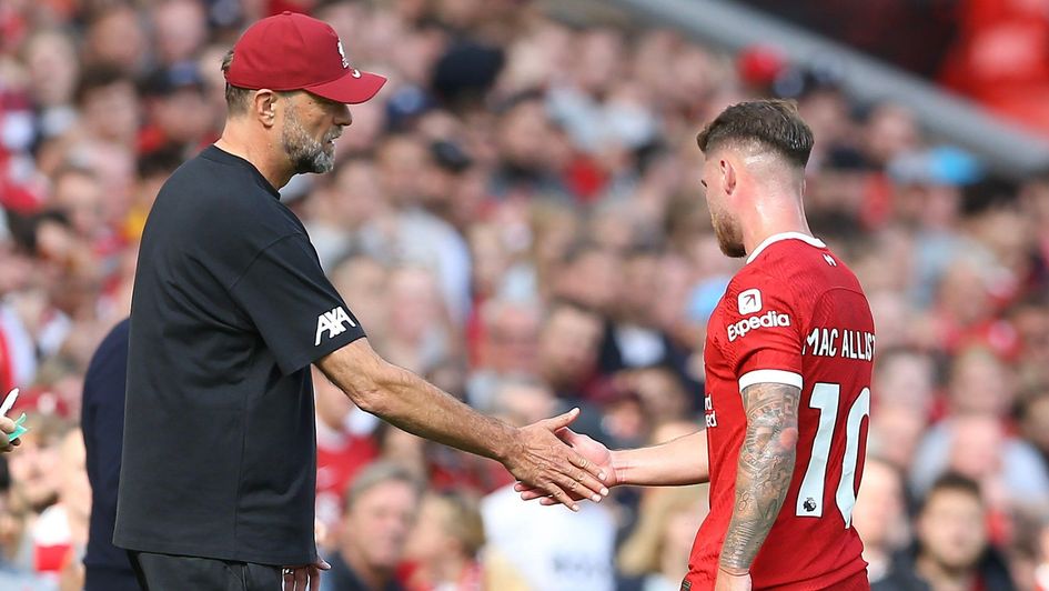 Alexis Mac Allister shakes hands with Jurgen Klopp