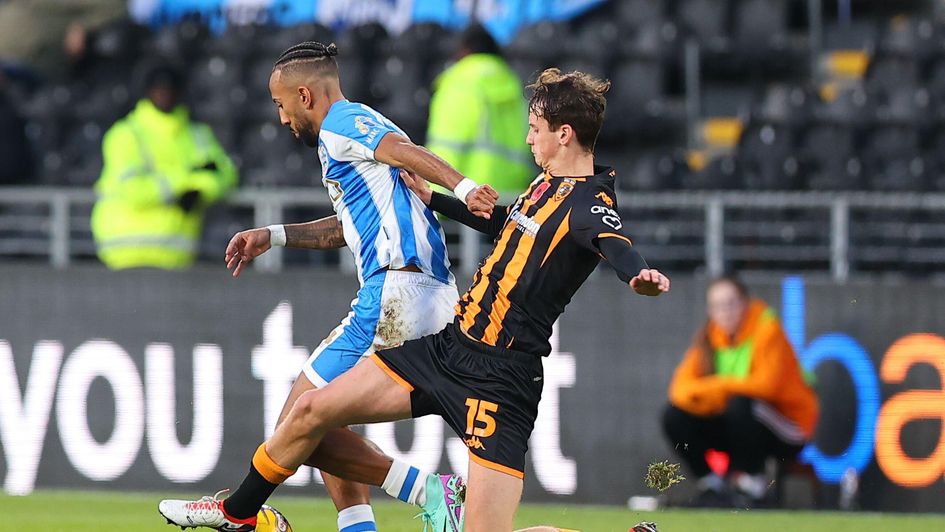 Tyler Morton tackling in Hull's win over Huddersfield