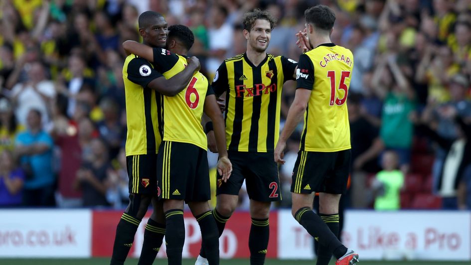 Watford players celebrate their win over Tottenham
