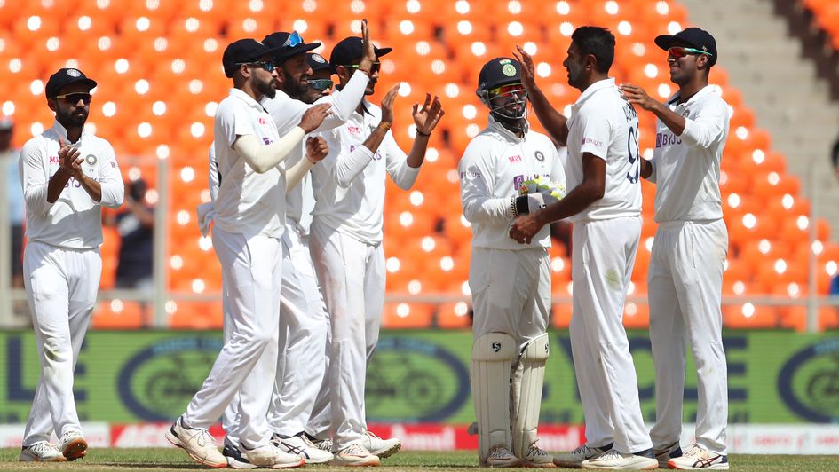 Ravichandran Ashwin celebrates the wicket of Joe Root