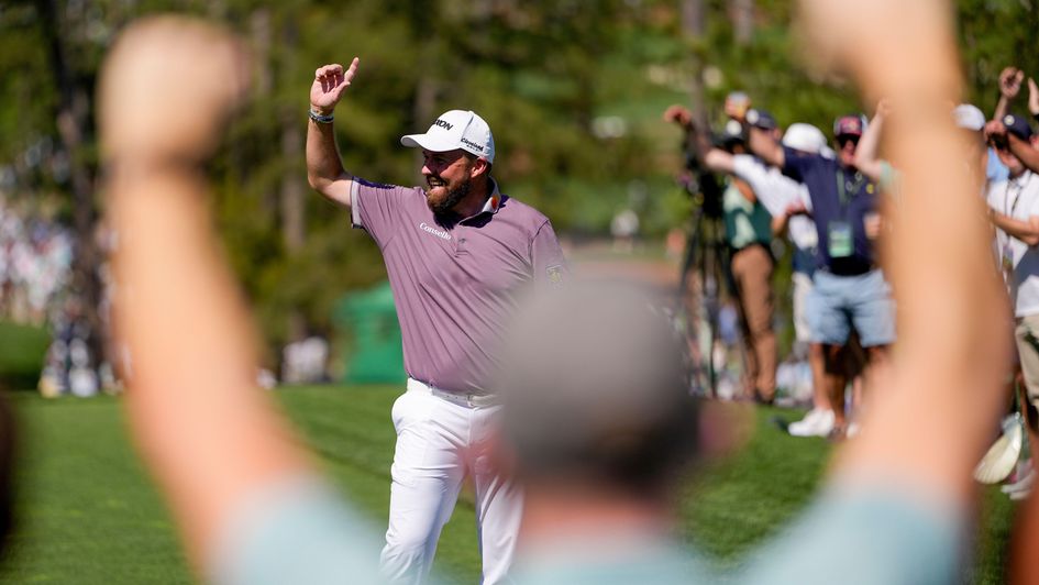 Shane Lowry celebrates a hole-in-one at the sixth