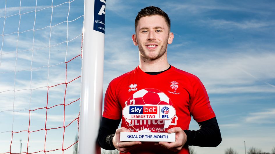 Shay McCartan with the Sky Bet League Two Goal of the Month award for January