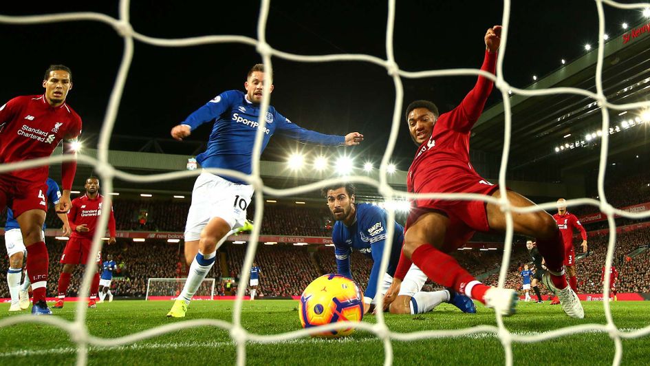 Joe Gomez makes a goal line clearance for Liverpool against Everton