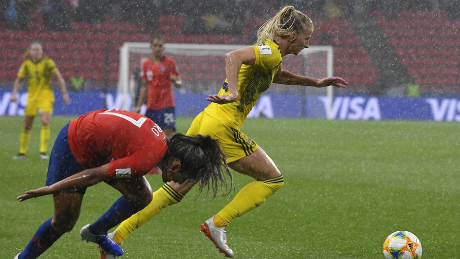 Sofia Jakobsson looks to battle through the rain