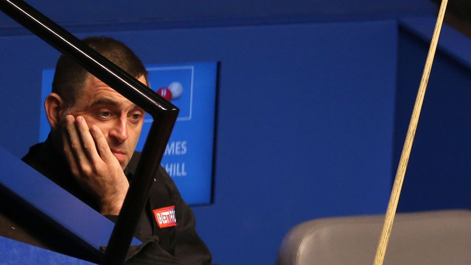 Ronnie O'Sullivan on his way out at the Crucible