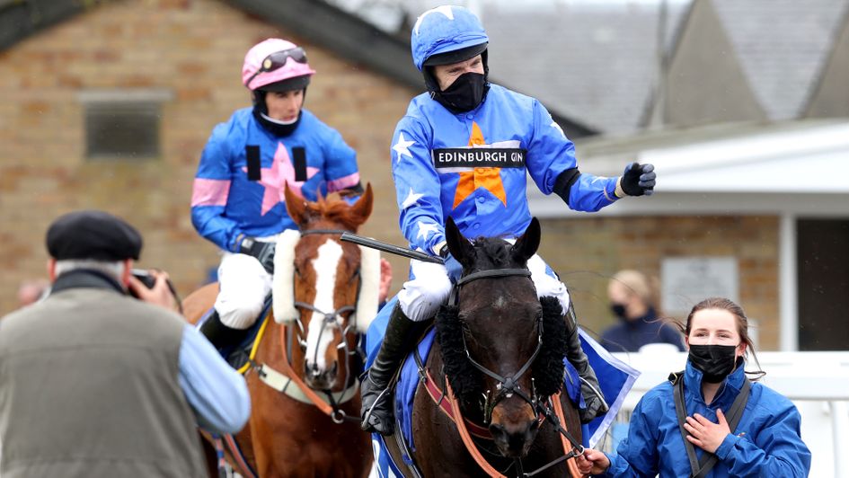 Tom Scudamore celebrates on Mighty Thunder