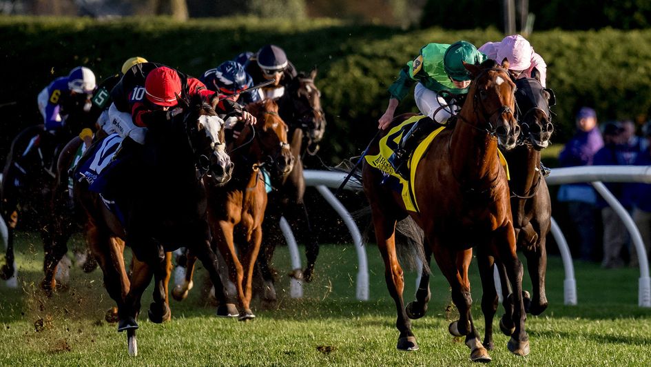 Haffner (green silks) holds Folsom Blues at bay