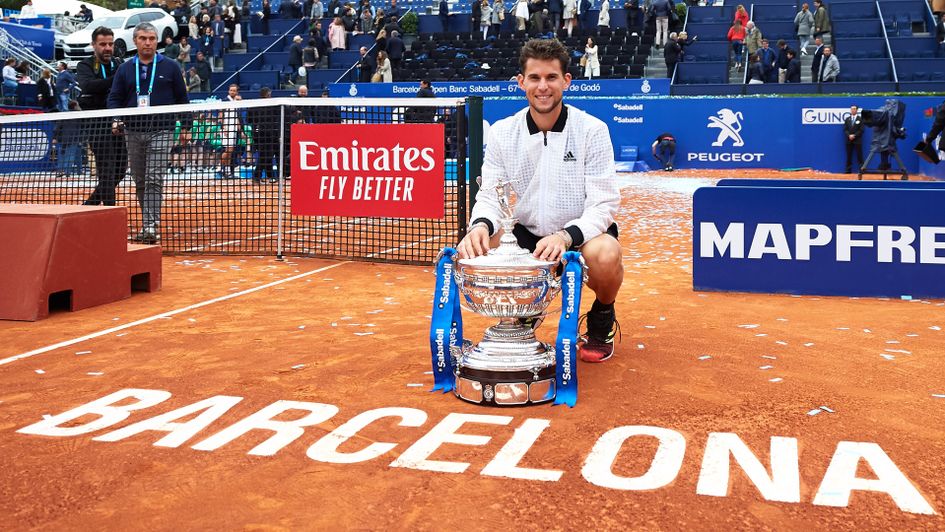 Dominic Thiem of Austria poses with the trophy after defeating Daniil Medvedev
