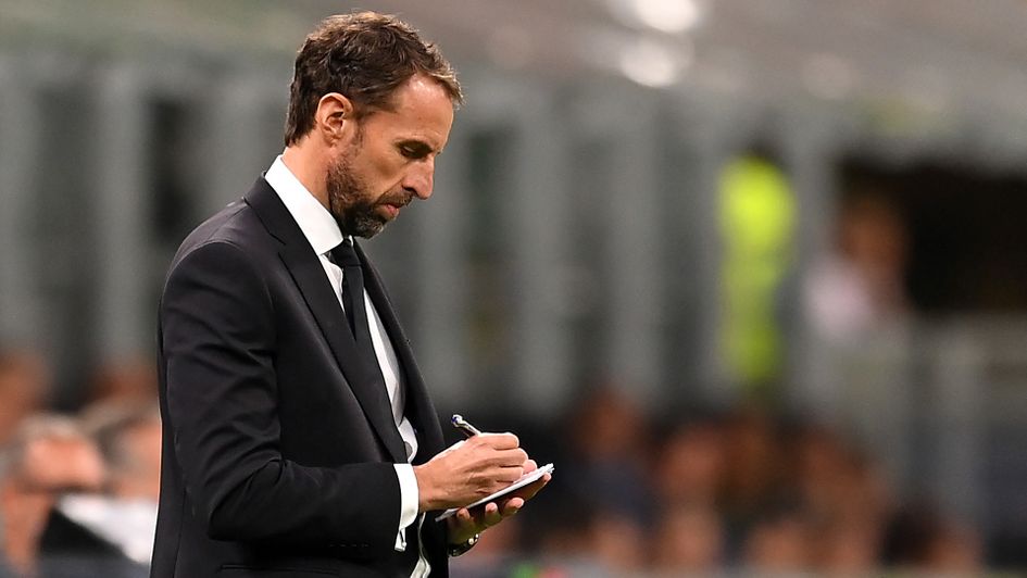 England manager Gareth Southgate makes notes