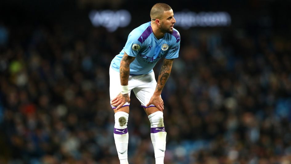Kyle Walker: Manchester City defender, pictured taking a breather in a frenetic derby against United