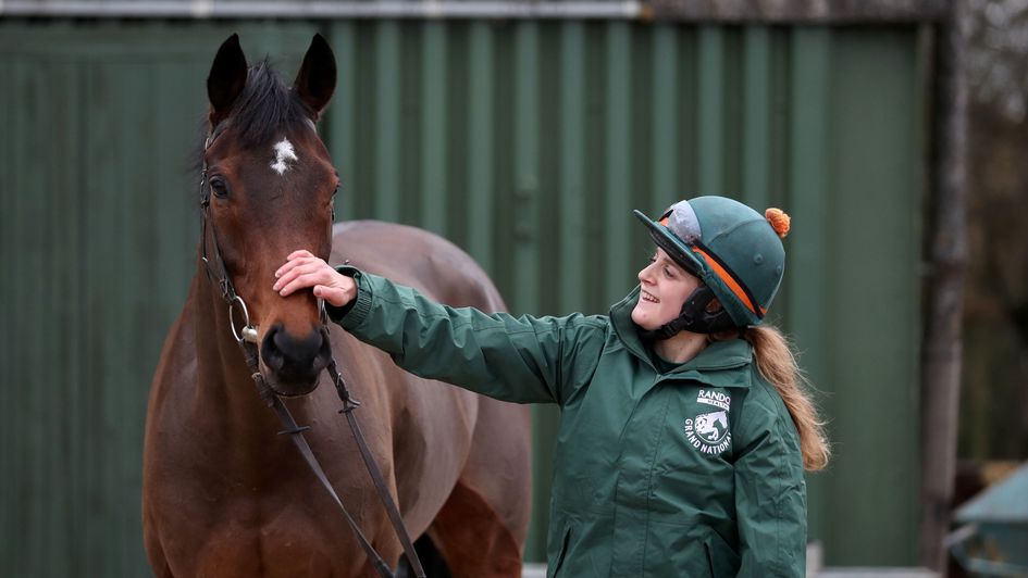 Stable lass Faye Shulton with Blaklion ahead of the Becher