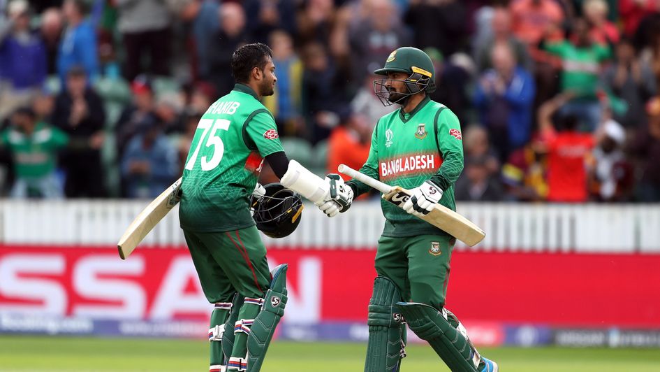 Bangladesh's Shakib Al Hasan (left) and Liton Das celebrate