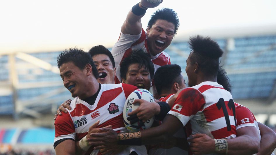Japan celebrate their win over South Africa in 2015 - rugby's biggest World Cup shock