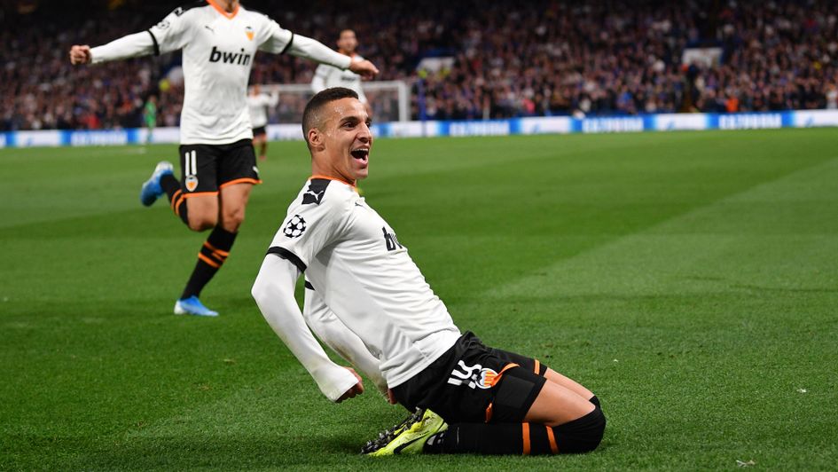 Rodrigo: Valencia forward celebrates his goal against Chelsea in the Champions League at Stamford Bridge