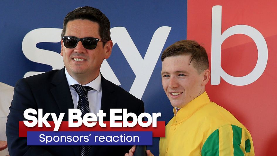 Colin Keane (right) receives his winning prize from Sky Bet's Conor Grant