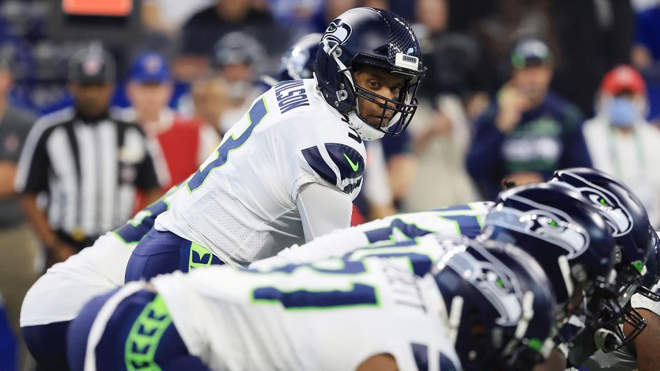 Seattle Seahawks quarterback Russell Wilson looks on prior to the snap