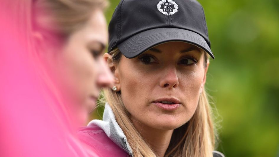 Erica Stoll in an Oak Hill GC cap