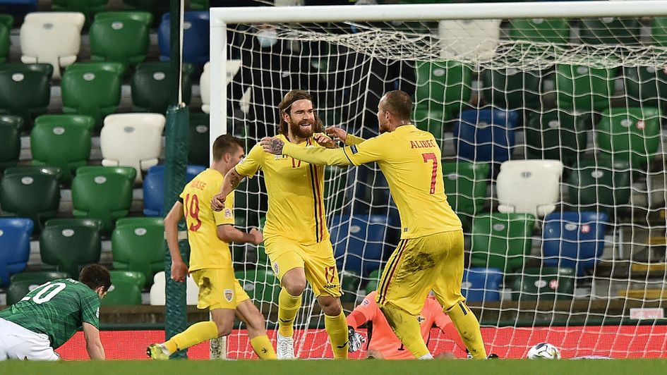 Romania celebrate Eric Bicfalvi's goal